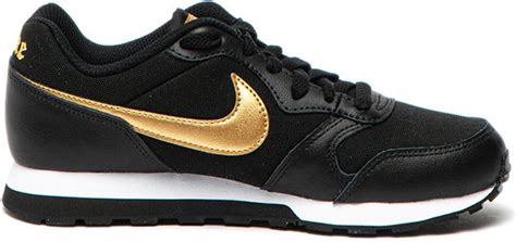 dames nike zwart goud